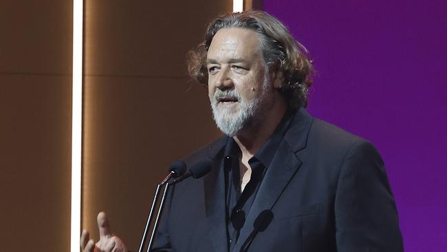 GOLD COAST, AUSTRALIA - FEBRUARY 07: Host Russell Crowe speaks during the 2025 AACTA Awards Presented By Foxtel Group at HOTA (Home of the Arts) on February 07, 2025 in Gold Coast, Australia. (Photo by Mackenzie Sweetnam/Getty Images)