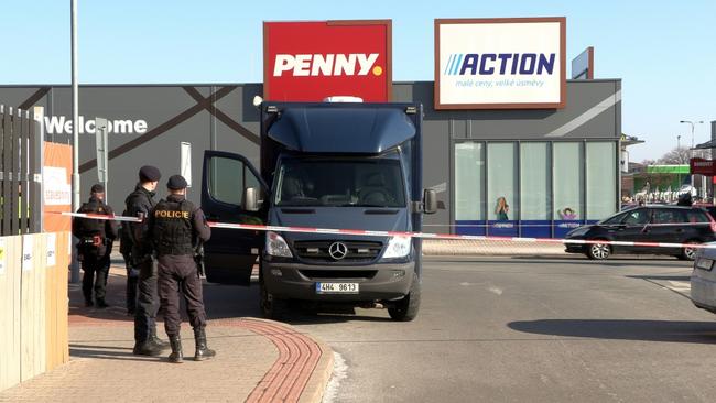 Czech police outside the cordonned off store