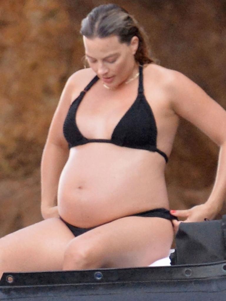 The Barbie star showed off her baby bump in a black bikini. Picture: CIAOPIX/COBRA TEAM/BACKGRID