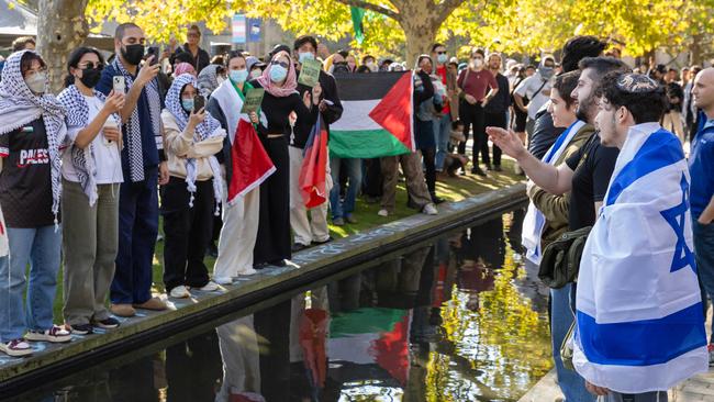 Pro-Palestinian and Jewish protesters face off near Melbourne University on Thursday. Picture: Jason Edwards