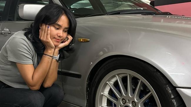 Alifia with her car, a BMW, which she regularly posted pictures of. Picture: Facebook