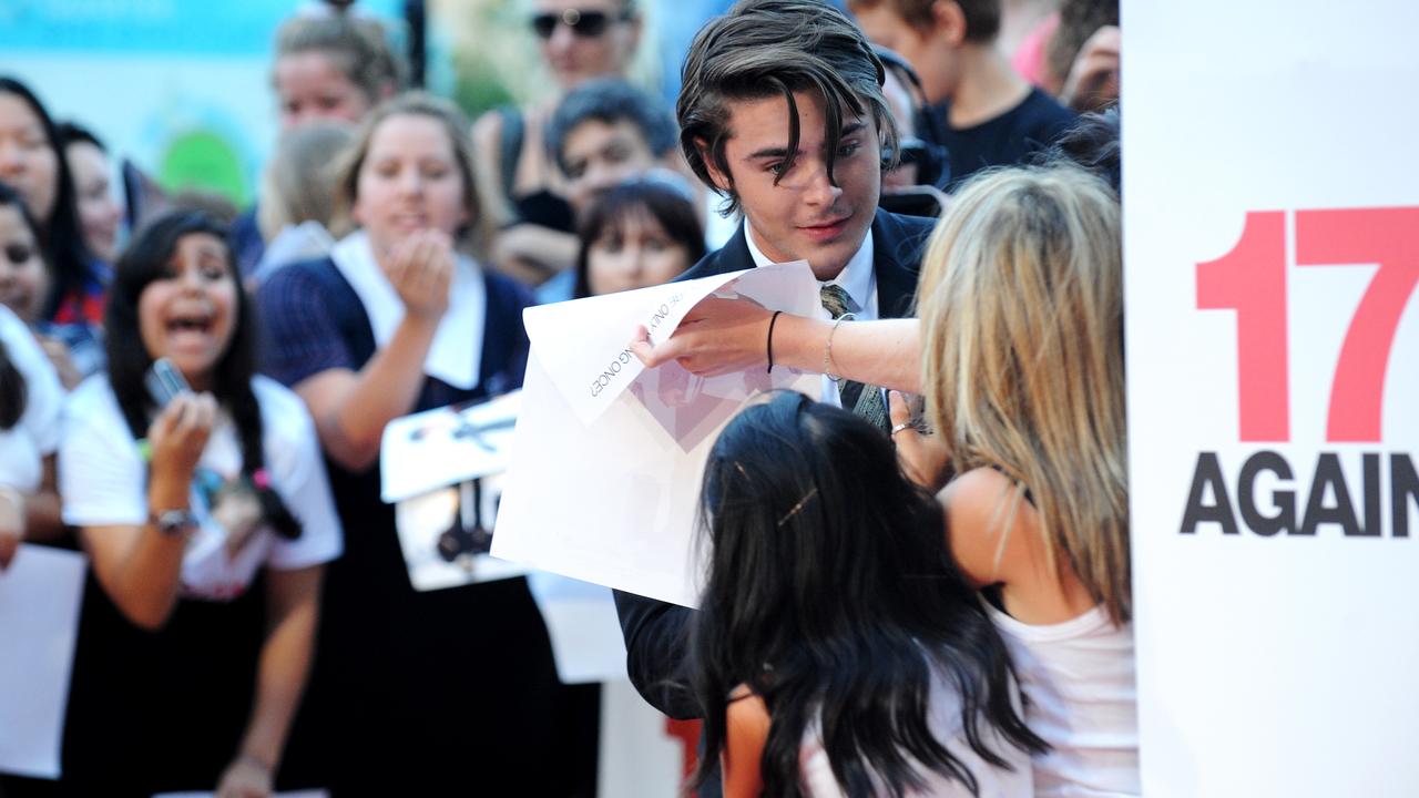 Zac Efron getting mobbed at the 17 Again Australian premiere in Sydney in 2009. Picture: AAP Image/Tracey Nearmy