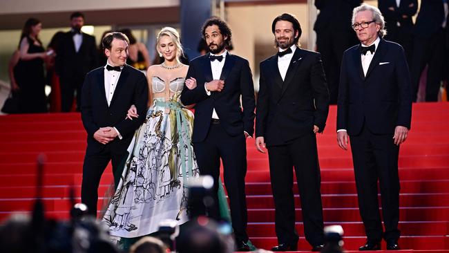 US screenwriter Gabriel Sherman, Bulgarian actress Maria Bakalova, Iranian director Ali Abbasi, Us actor Sebastian Stan and US actor Martin Donovan leave after the screening of The Apprentice. Picture: Loic Venance, via AFP.