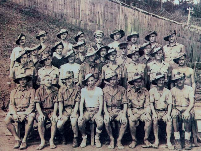 Norvyn Stevens, third row, far left, with fellow POWs in the camp in Ohama, Japan, September 1945.