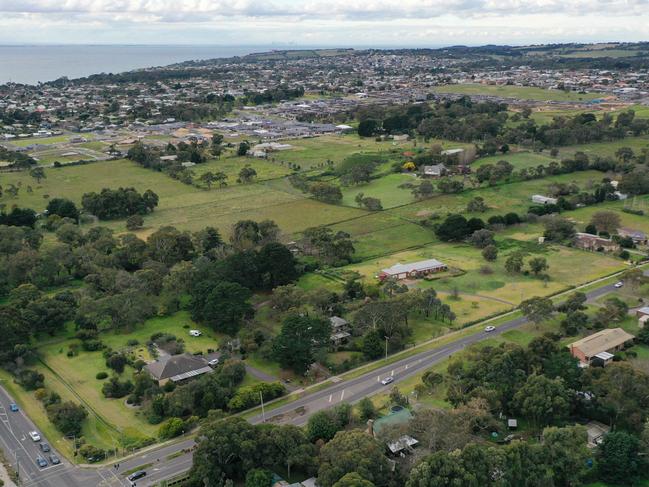 The rezoned land where 550 houses will be installed. Glenda MacNaughton and Patrick Hughes live in the house at the bottom left of picture.. Picture: Alan Barber