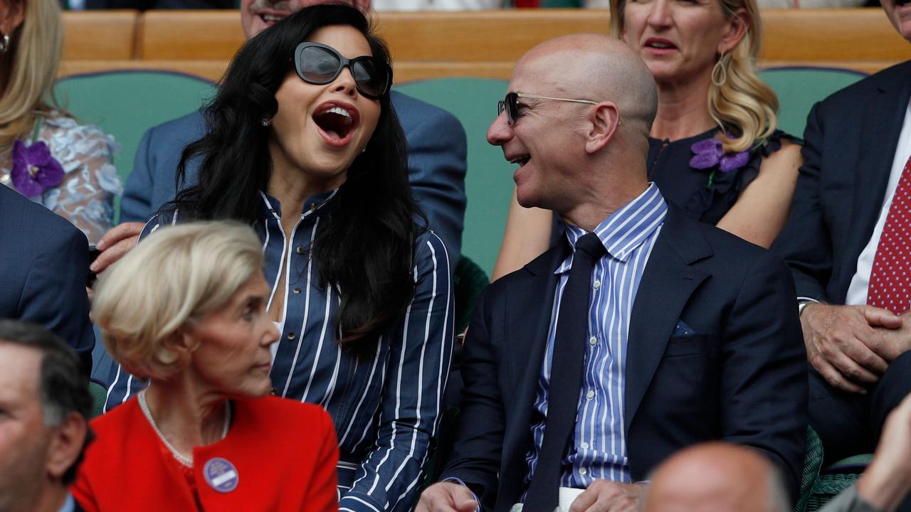 Jeff Bezos (right) and Lauren Sanchez at the 2019 Wimbledon Championships in London. Picture: Adrian Dennis/AFP