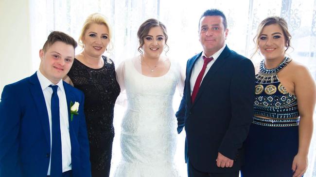 Unit “Ergun” Bolat with his former wife Melek and his three eldest children Umut (left), Merve (centre) and Ebru (right). Picture: Supplied