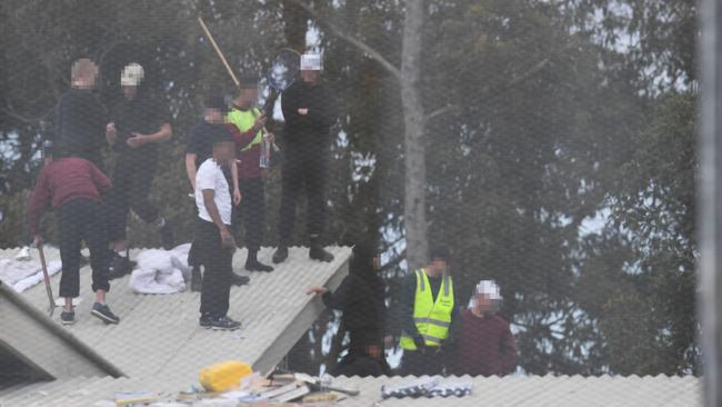 Detainees on the roof of Frank Baxter Youth Justice Centre in Kariong last year. Picture: Peter Lorimer