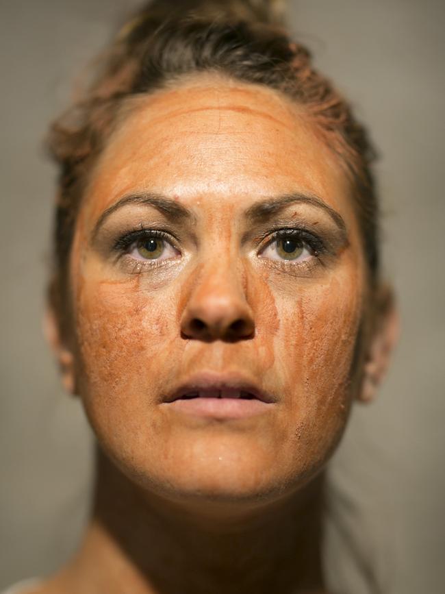 Performer Sinsa Mansell, pictured with ochre on her face, is the new senior producer of Performing Lines TAS. Picture: Eddie Safarik