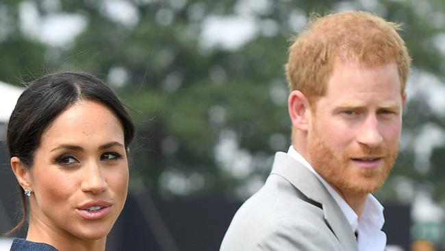 WINDSOR, ENGLAND - JULY 26:  Meghan, Duchess of Sussex and Prince Harry, Duke of Sussex attend the Sentebale ISPS Handa Polo Cup at the Royal County of Berkshire Polo Club on July 26, 2018 in Windsor, England.  (Photo by Karwai Tang/WireImage)