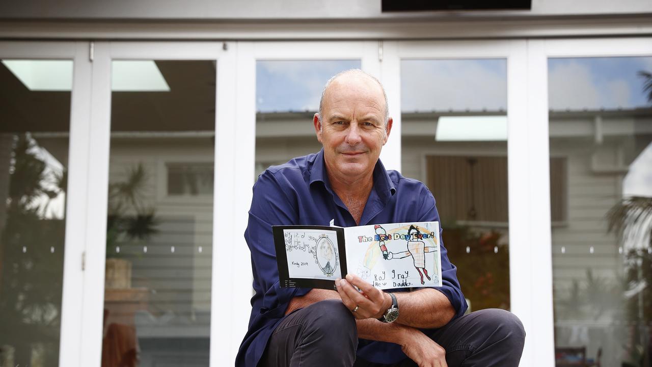 Author Andrew Daddo pictured at home with one of the book projects. He said the digital co-author program helps kids let their imagination run wild during the COVID-19 pandemic. Picture: Sam Ruttyn