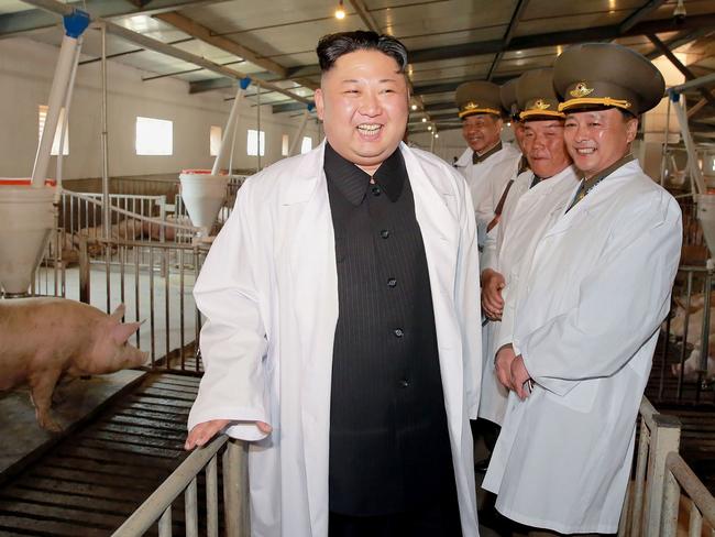 Kim’s visit to the pig farm was publicised on the same day North Korea said it was ready to sink a US warship.