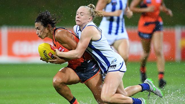 Amanda Farrugia is tackled by Emma Humphries. Picture: AAP