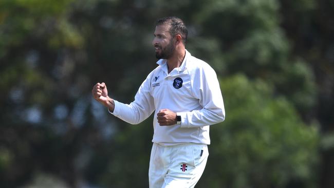 Fawad Ahmed of Melbourne University reacts after taking a wicket during the Premier Cricket match between Fitzroy Doncaster and Melbourne Uni at Schramms Reserve in Doncaster, Saturday, February 8, 2020. (Photo/JulianSmith) NO ARCHIVING