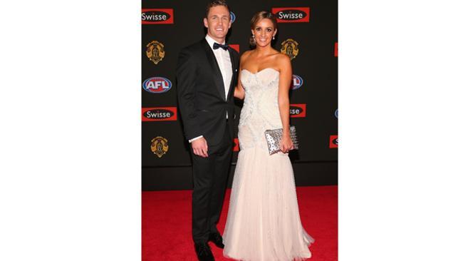 Classic: Joel Selwood of the Cats and his partner Kathryn Cotsopoulos. Photo: Getty