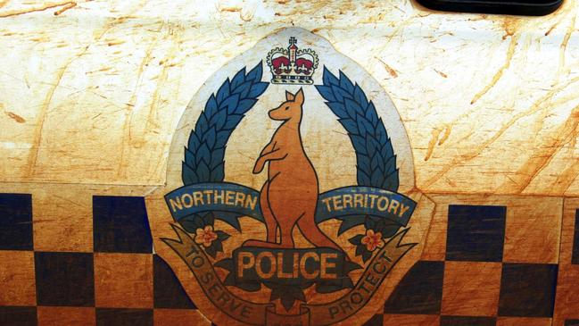 An NT Police Officer has been suspended without pay for serious breaches of discipline and is allegedly responsible for producing and distributing provocatively worded T-shirts. Picture: AAP Image/Dave Hunt