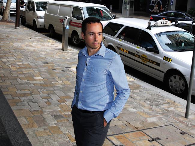 Drink Better Wine co-owner Jules Gutierrez says illegally parked taxis have become a huge issue.