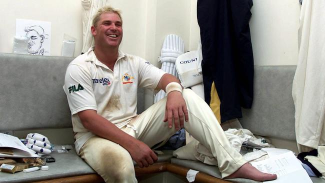 Shane Warne in the dressing room at The Oval in London after taking his 400th Test wicket in 2001. Picture: Brett Costello.