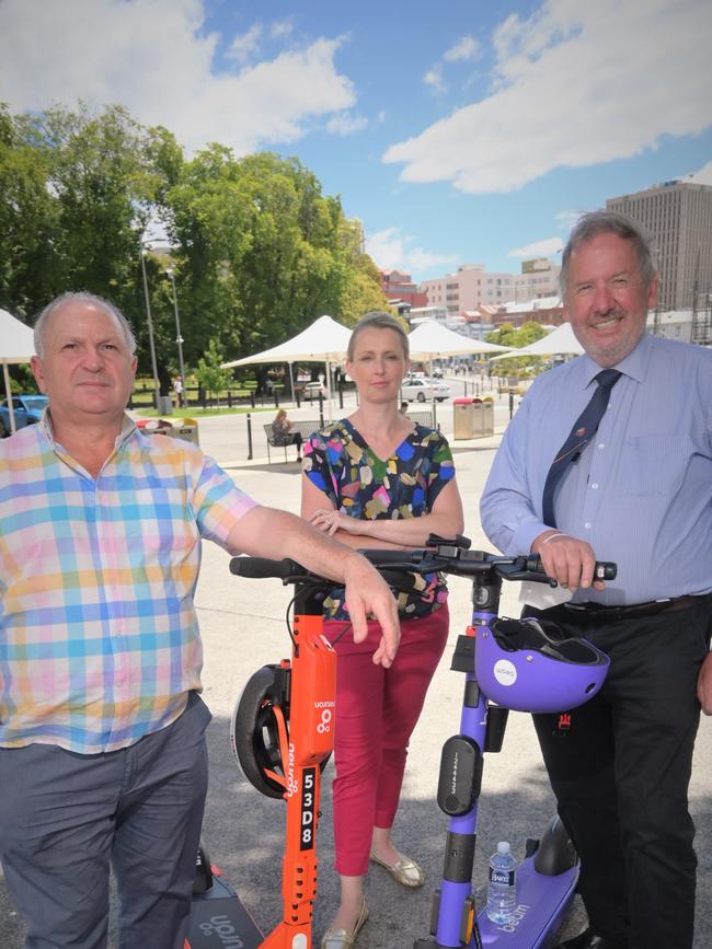 Marti Zucco, Louise Elliot, and Jeff Briscoe demand a halt to the Hobart e-scooter trial. Picture: Kenji Sato