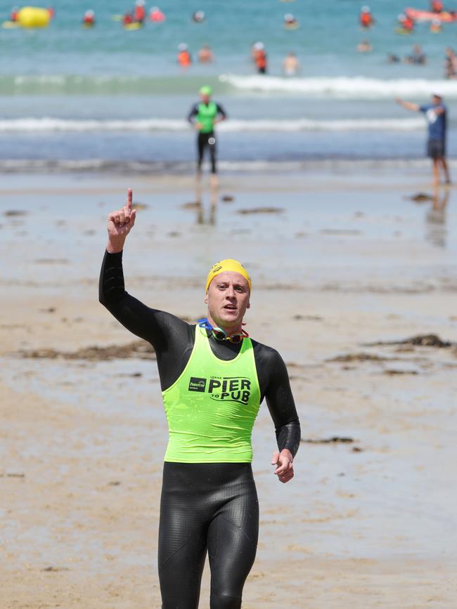 Nick Sloman closes in on the finish line ahead of Sam Short. Picture: Mark Wilson