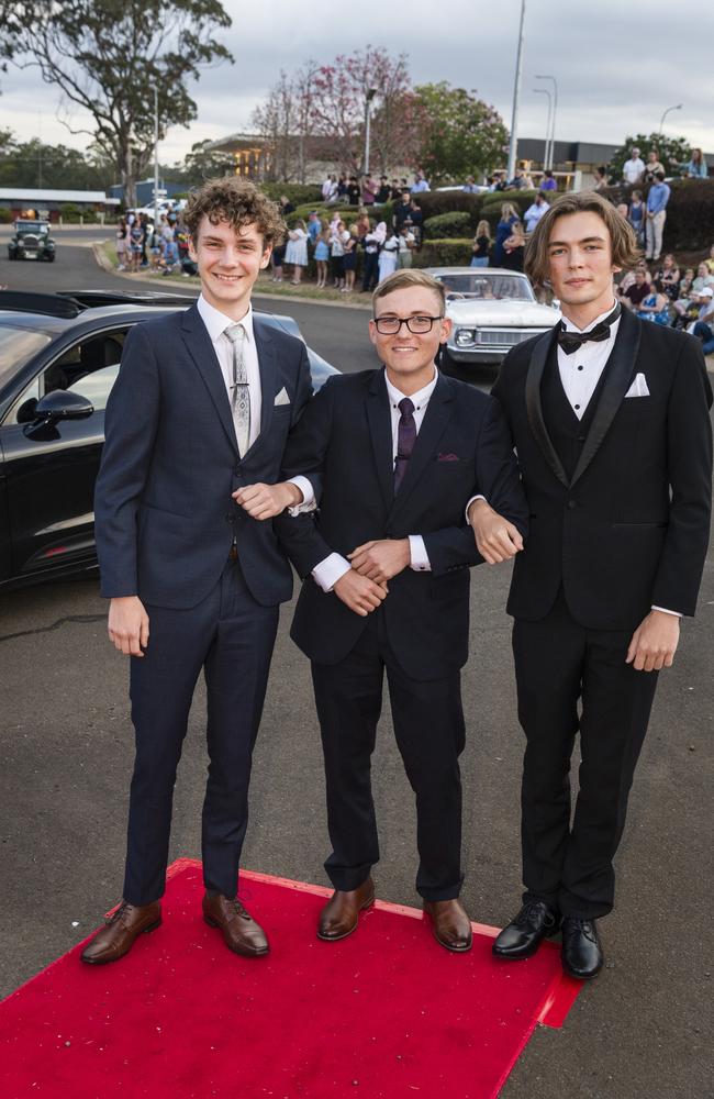 At Harristown State High School formal are (from left) William Jack, Ben Arthur and Mathew Sipple at Highfields Cultural Centre, Friday, November 17, 2023. Picture: Kevin Farmer