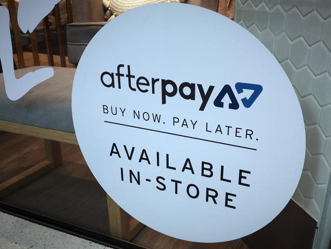 An Afterpay sign is seen in a store window in a shopping centre in Sydney, Tuesday, February 26, 2019. (AAP Image/Derek Rose) NO ARCHIVING