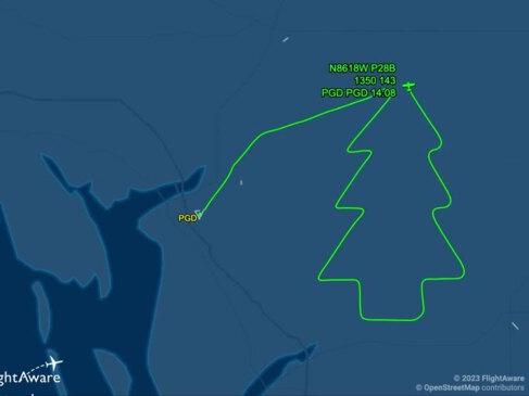 Pilot in Festive Spirit Flies in Christmas Tree Pattern Over Florida
