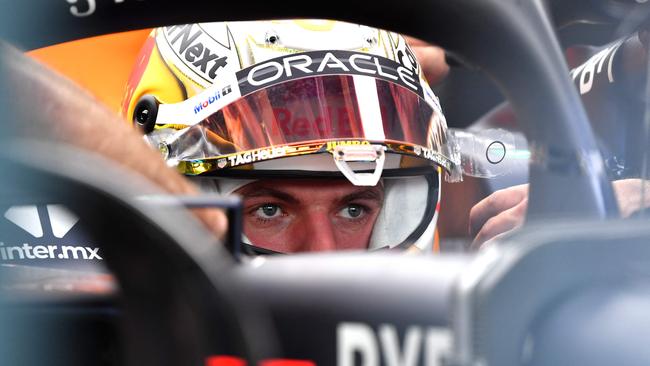 Red Bull's Dutch driver Max Verstappen sits in his car