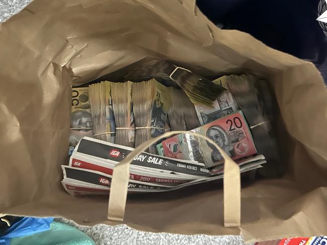 $1m in cash was also discovered following the search. Picture: AFP