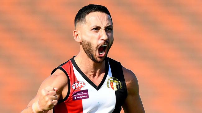 Ahmed Hamdan of West Coburg celebrates kicking a goal during the round two EDFL Strathmore Community Bank Division One Seniors match between West Coburg and Hillside at Shore Reserve, on April 20, 2024, in Melbourne, Australia. (Photo by Josh Chadwick)