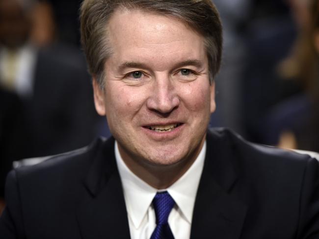 US Supreme Court nominee Brett Kavanaugh arrives on the first day of his confirmation hearing in front of the US Senate on Capitol Hill in Washington DC, on September 4, 2018. - President Donald Trump's newest Supreme Court nominee Brett Kavanaugh is expected to face punishing questioning from Democrats this week over his endorsement of presidential immunity and his opposition to abortion. Some two dozen witnesses are lined up to argue for and against confirming Kavanaugh, who could swing the nine-member high court decidedly in conservatives' favor for years to come. Democrats have mobilized heavily to prevent his approval. (Photo by SAUL LOEB / AFP)