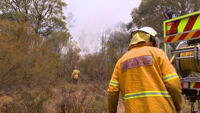 RFS volunteers at Buxton, NSW, during the Black Summer bushfires. Picture: AAP Image / Andrew Leeson