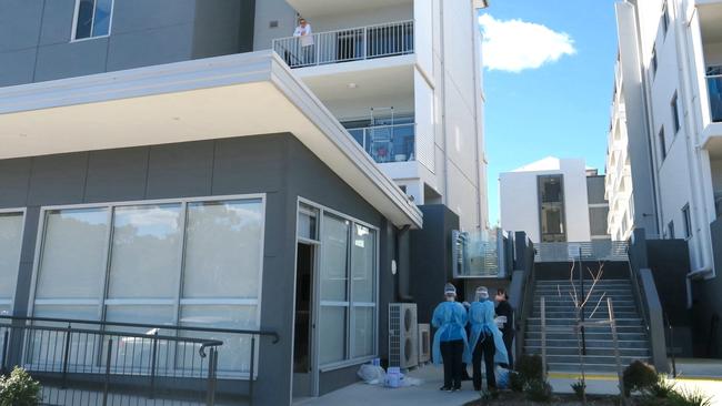 NSW Health workers conducting Covid tests at a unit block at Sturt Rd, Cardiff. Picture: Emily Burley.