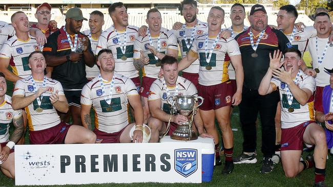 Thirlmere celebrate their Premiership. A Grade  Grand Final. Camden Rams (red and blue ) v Thirlmere Roosters (maroon and white). Macarthur Rugby League Grand Final Day. Picture: John Appleyard