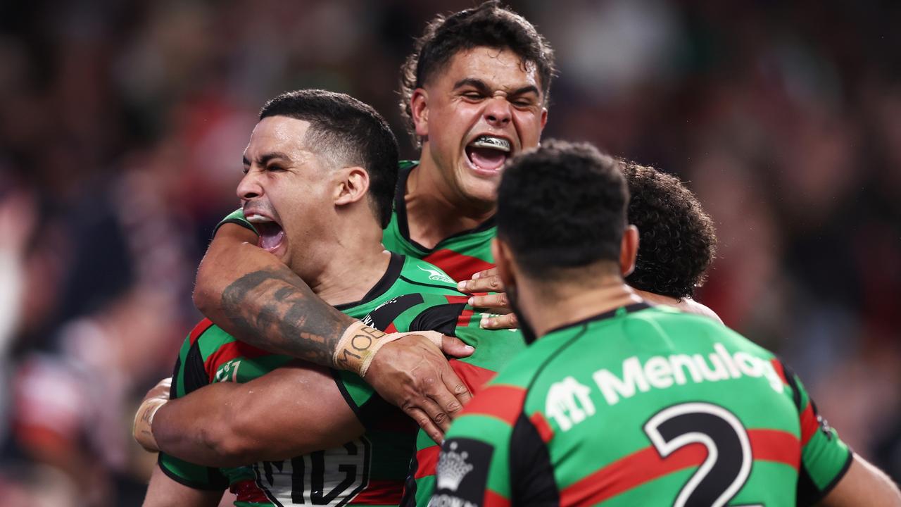 SYDNEY, AUSTRALIA - SEPTEMBER 11: Isaiah Tass of the Rabbitohs celebrates with Cody Walker and Latrell Mitchell after scoring a try during the NRL Elimination Final match between the Sydney Roosters and the South Sydney Rabbitohs at Allianz Stadium on September 11, 2022 in Sydney, Australia. (Photo by Matt King/Getty Images)