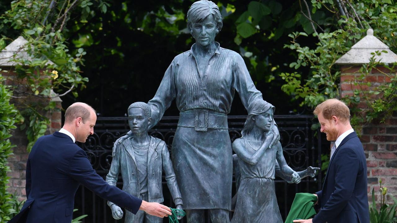 Prince William and Prince Harry with the statue of their mother, Princess Diana. Picture: Dominic Lipinski – WPA Pool/Getty Images