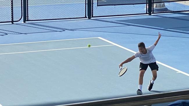 Joshua Wilson during one of his tennis tournament triumphs. Picture: Tonia Wilson