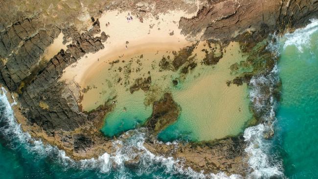 47/71Champagne Pools, Fraser Island / K'gari - Queensland
Bubble away happily in these spectacular naturally fizzing baths, located on 75 Mile Beach on the east coast of Fraser Island. Picture: Tourism and Events Queensland