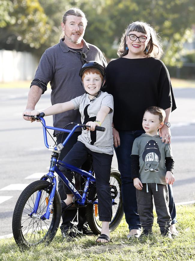 Glen, Maxwell, Penny and Digby Spalding near their home at Morningside in Brisbane’s east. Picture: AAP/Josh Woning