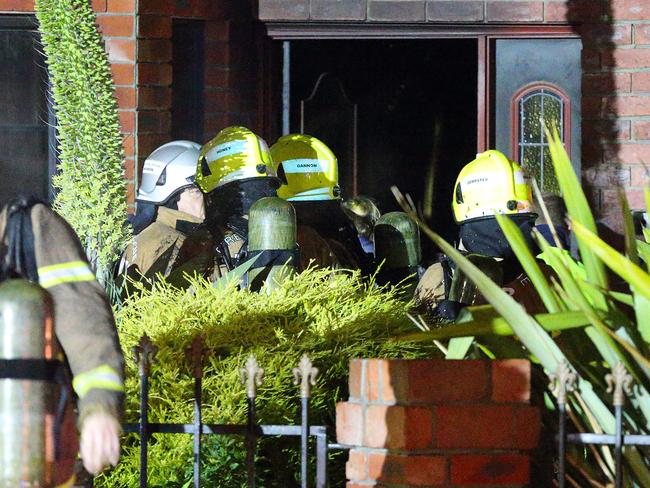 WEST FOOTSCRAY, VICTORIA - JUNE 10: Fire fighters bring out a resident from the building. 31 Clive Street on June 10, 2018 in West Footscray, Victoria. (Photo by Patrick Herve) Fees Exist)