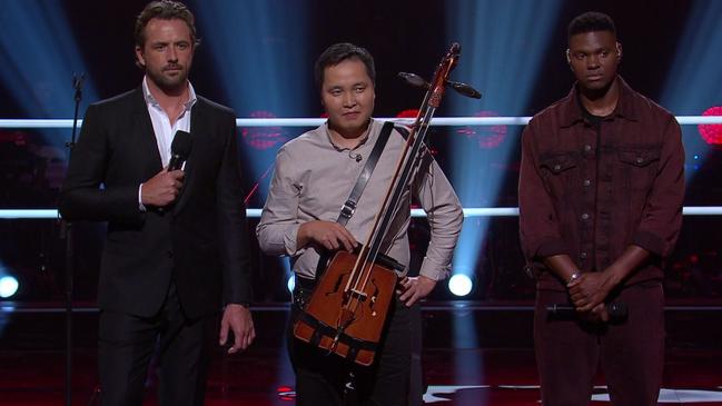 Host Darren McMullen with Bukhu and Johnny.