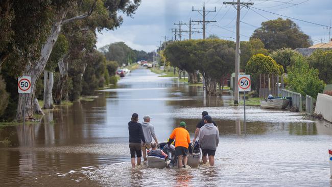 Locals came to the rescue of Kate Pianta, Ray and dog Grace. Picture: Jason Edwards