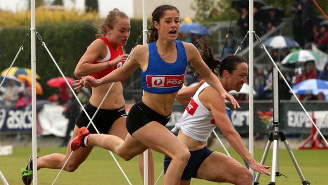 Grace O'Dwyer in the Blue wins the 2015 Stawell Gift for women. Picture: Mark Dadswell