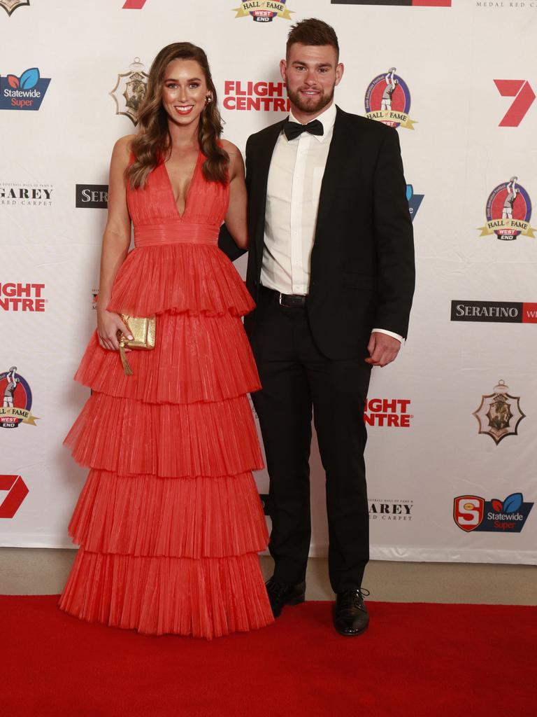 Nicole Cocks and Mitch Grigg pose for a picture on the red carpet at Adelaide Oval in North Adelaide, for the Magarey Medal, Monday, September 9, 2019. Picture: Matt Loxton