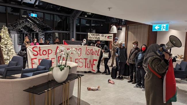 Pro-Palestinian activists ambushed visiting friends and families of Israeli hostages at the Melbourne hotel they were staying at.