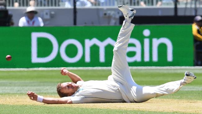 Neil Wagner slips has he tries to field on his follow-through. Picture: AFP