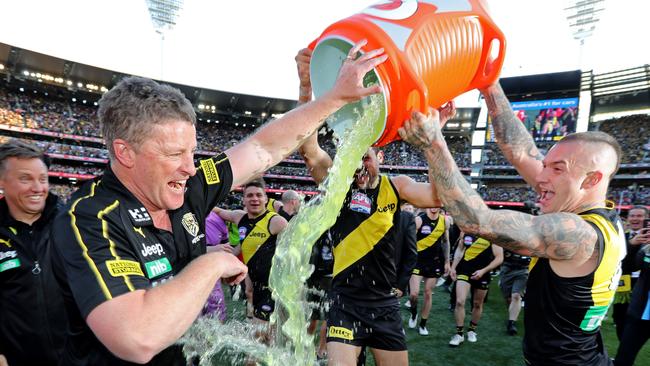 Dustin Martin pours the Gatorade bin over coach Damien Hardwick. Picture: Michael Klein.