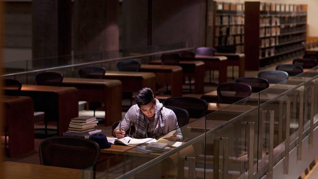 Student visa crackdowns mean jostling for space in the library is a thing of the past. But it's misery for providers. Pic via Getty