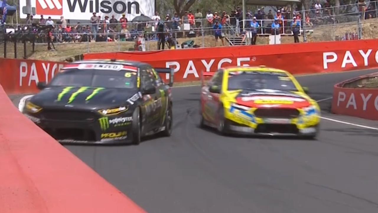 David Russell crashes after contact from Tickford teammate Chaz Mostert.
