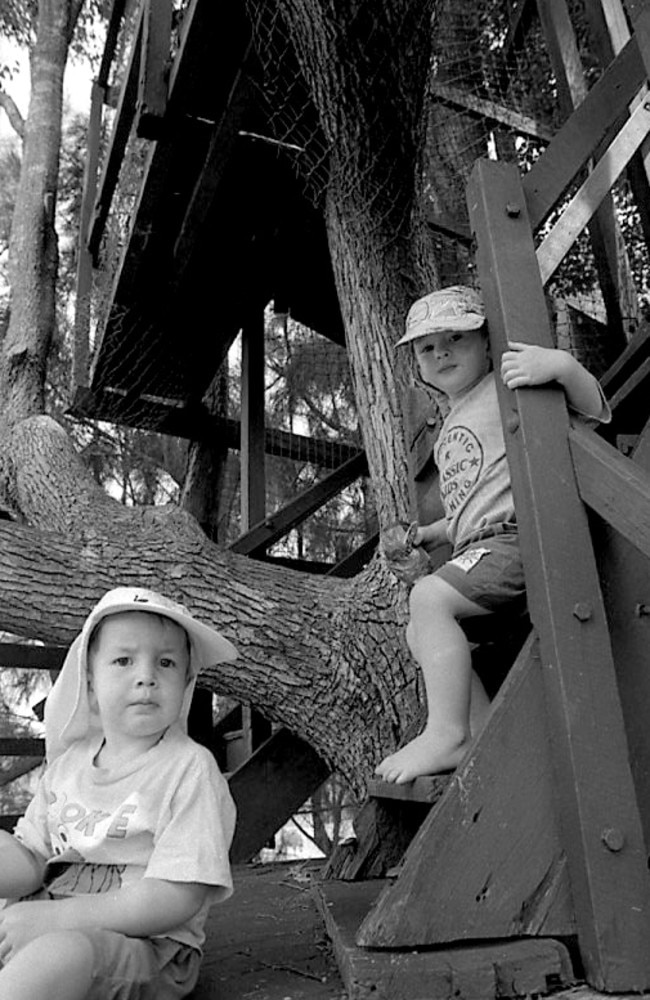 Kids play in the treehouse at Willow Springs Adventure Park, Spring Street.